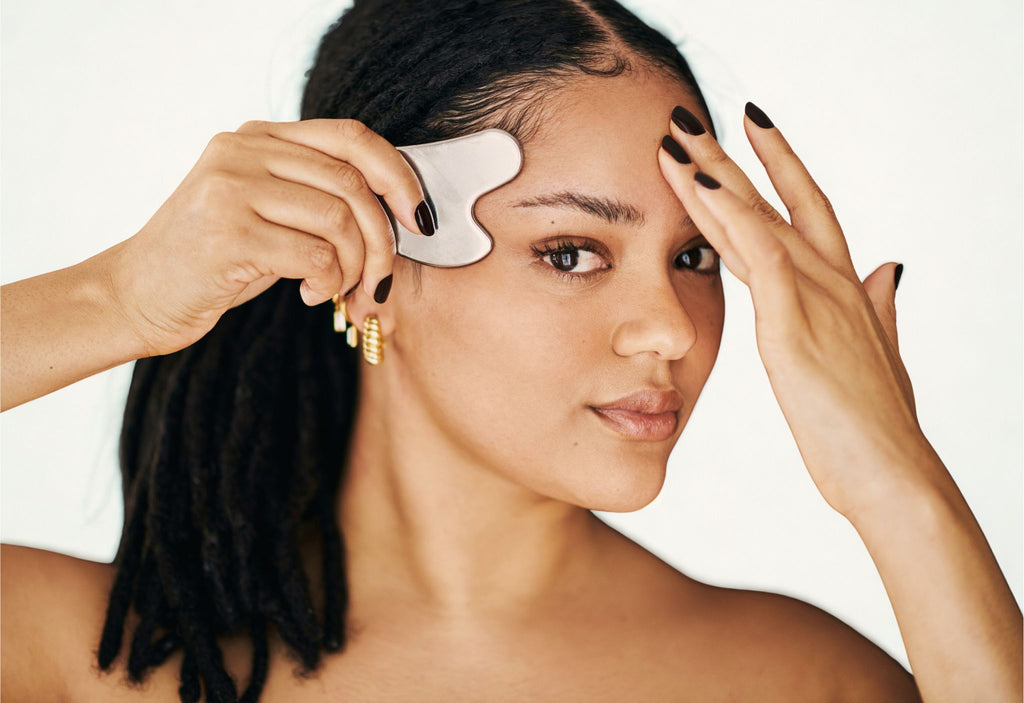 stainless steel gua sha, face tool, skincare routine, lymphatic drainage, facial sculpting